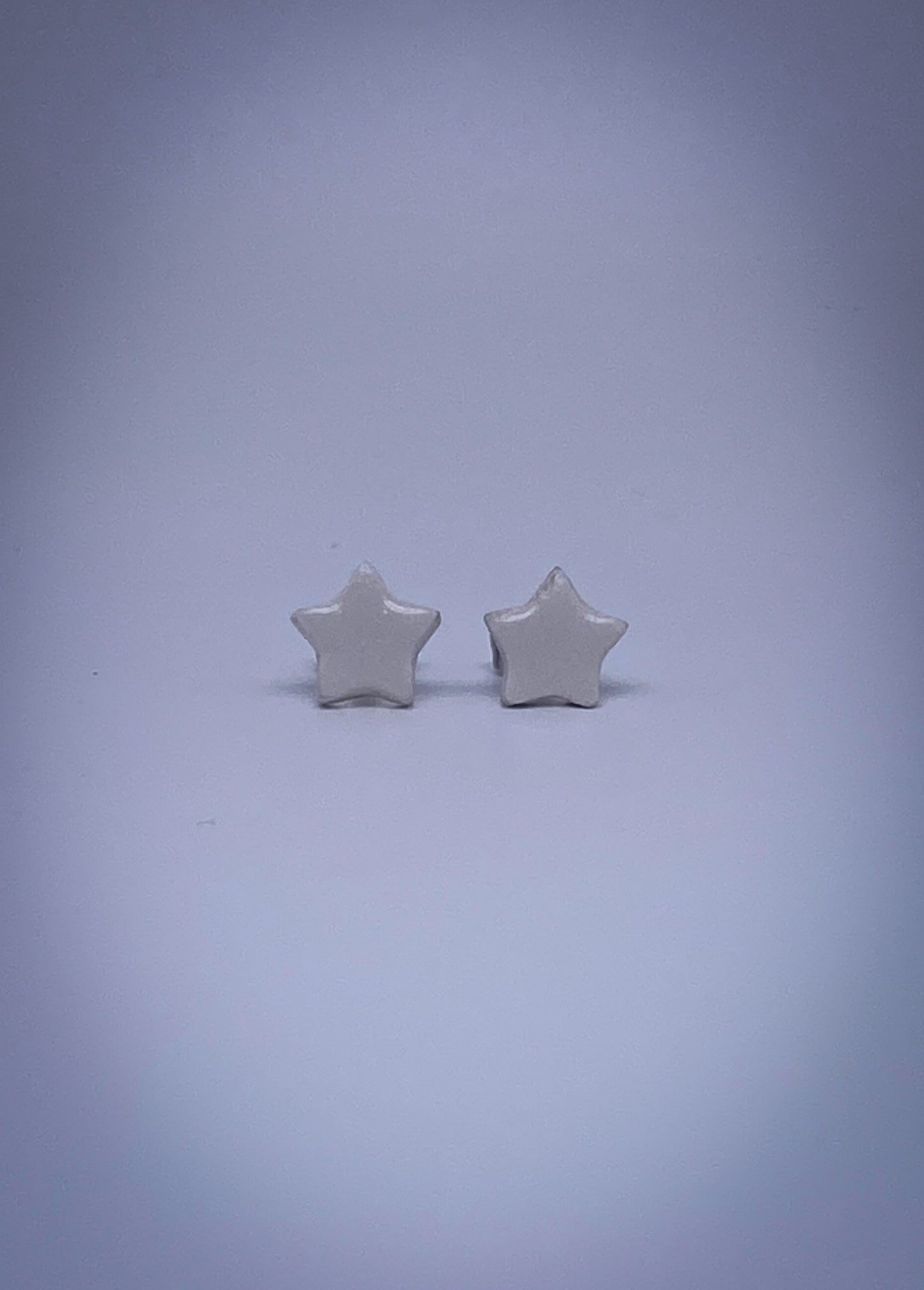 Semplicity Stars White | Orecchini stella bianchi in ceramica