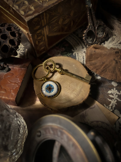 Portachiavi Nazar Eye in ceramica con lustri oro e platino